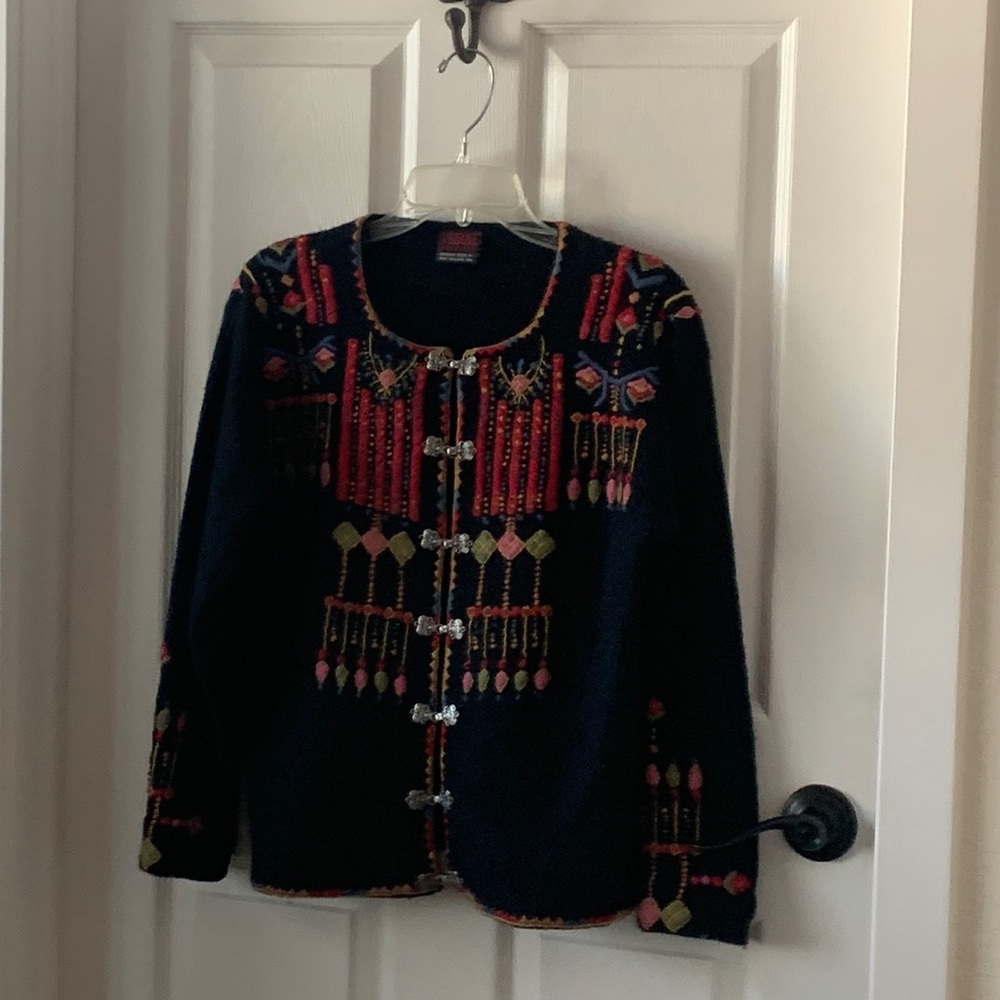 Vrikke sweater size small. 20”wide. Shoulder to hem: 23”. Shoulder to cuff: 20”